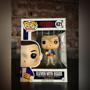Funko Pop! Eleven with Eggos Figure - Blue and Brown